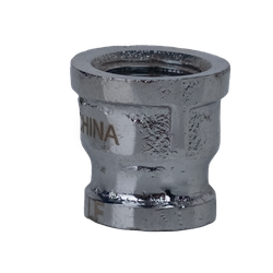 A precision-formed 3/4 x 1/2 inch chrome-plated lead-free coupling showcasing its strong build and reflective finish - 3/4 x 1/2 Chrome Lead-Free Reducer